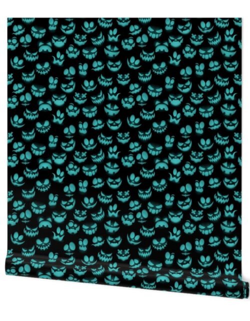 Mini Grinning Halloween Jack o Lantern Faces in Aqua on Black Wallpaper