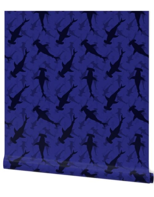Hammerhead Sharks in Blue Silhouette Circling in Dark Blue Water Wallpaper