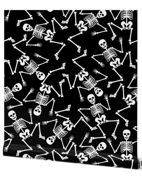 Large White Dancing Halloween Skeletons Scattered On Black Wallpaper