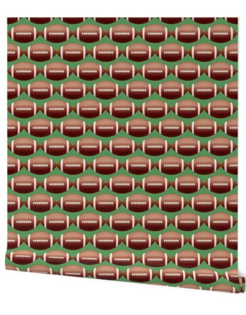 4 inch Gridiron American Pigskin Football with Lacing and Stitching on Field Green Wallpaper