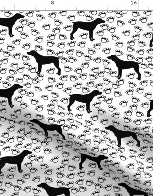 Big Black Dog and Paw Prints on White Fabric