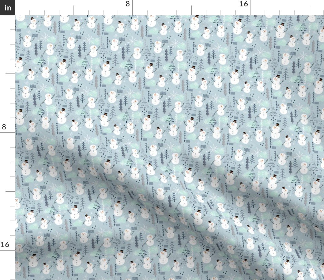 Christmas Snowman Character with Trees and Snowflakes on Icy Mint Blue Fabric