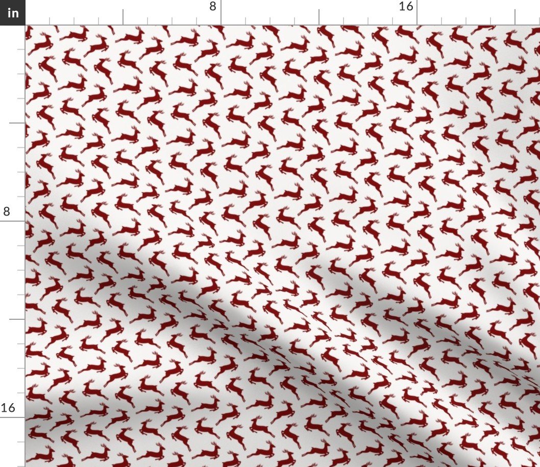 Dark Christmas Candy Apple Red Leaping Reindeer on White Fabric Dark Christmas Candy Apple Red Leaping Reindeer on White Fabric