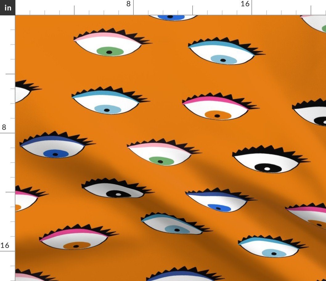 Evil Eyes Multi -Colored on Bright Orange Fabric Evil Eyes Multi -Colored on Bright Orange Fabric