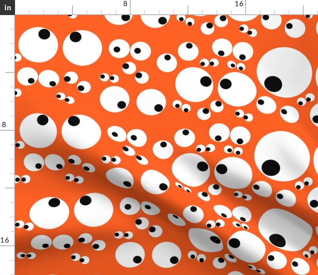 Googly Goo Goo Eyes on Neon Orange Fabric Googly Goo Goo Eyes on Neon Orange Fabric