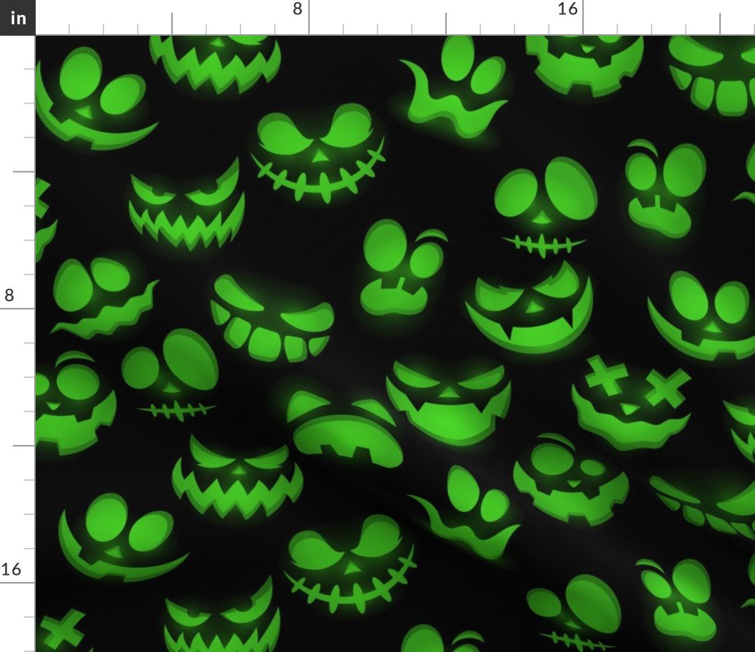 Grinning Halloween Jack o Lantern Faces in Neon Green on Black Fabric