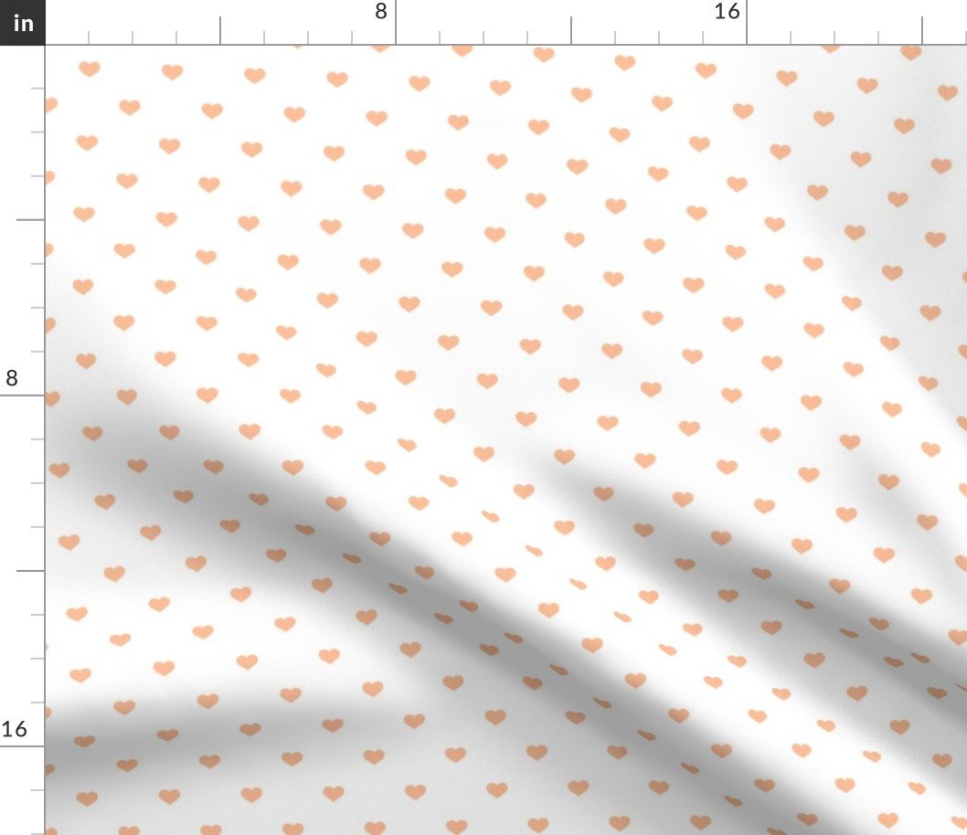 Half Inch Love Hearts in Peach Fuzz Color of the Year 2024 on White Fabric
