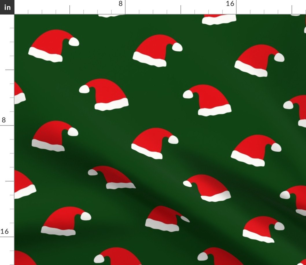 Jolly Old Saint Nick Red Santa Christmas Hats on Forest Green Fabric Jolly Old Saint Nick Red Santa Christmas Hats on Forest Green Fabric