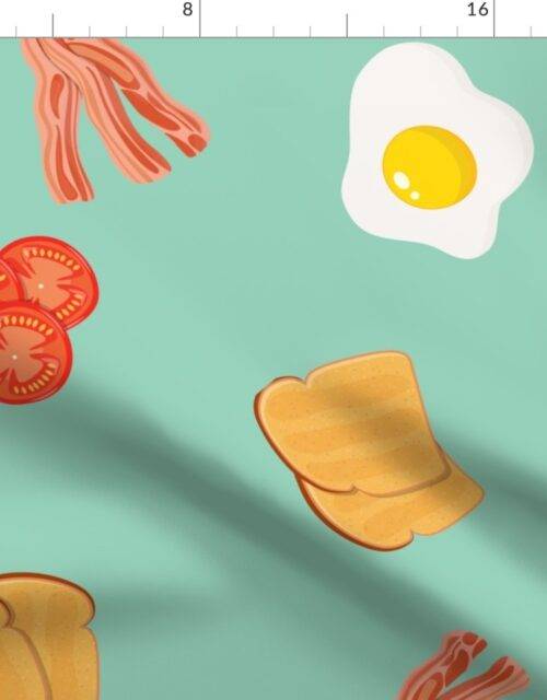 Large English Cooked Breakfast Bacon, Eggs, Tomato and Toast on Green Fabric