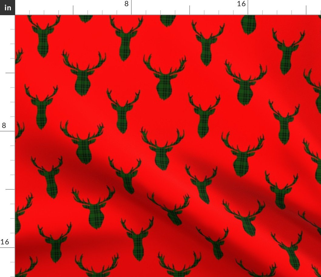 Large Green and Black Tartan Silhouetted Buck Deer Trophy Heads with Antler Racks Mounted on Red Fabric