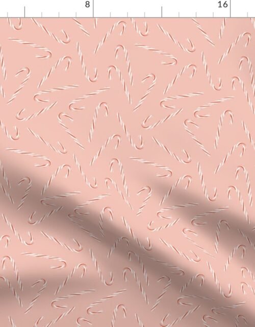 Mini Christmas Candy Canes on Peach Fabric