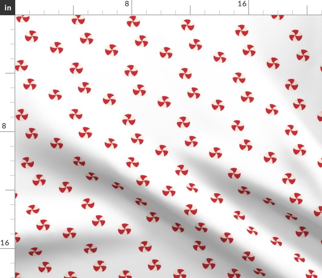 Peppermint Swirls in Red and White Scattered Randomly on White Fabric Peppermint Swirls in Red and White Scattered Randomly on White Fabric
