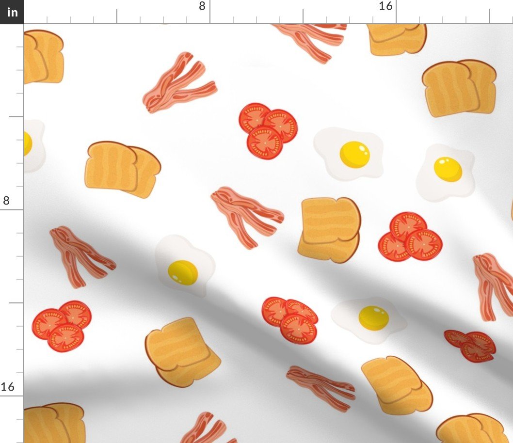 Small English Cooked Breakfast Bacon, Eggs, Tomato and Toast on White Fabric