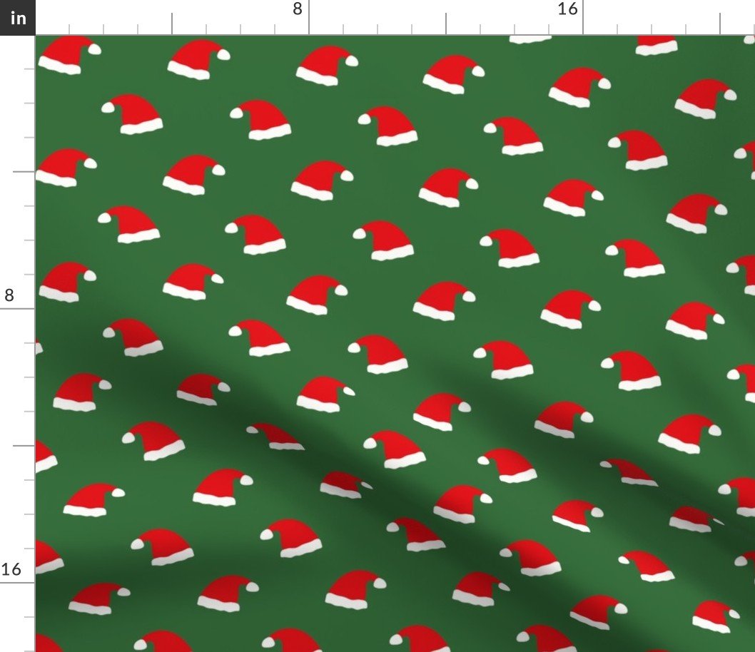 Small Jolly Old Saint Nick Red Santa Christmas Hats on  Tree Green Fabric
