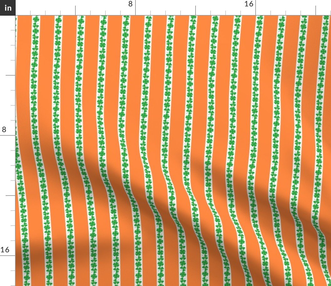 St. Patricks 3 and 4-Leafed Shamrocks in Kelly Green on Orange Fabric