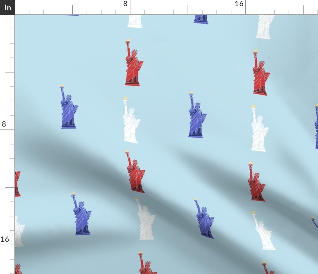 USA Hand drawn Motif of the Statue of Liberty in Red, White and Blue on Pale Blue Fabric