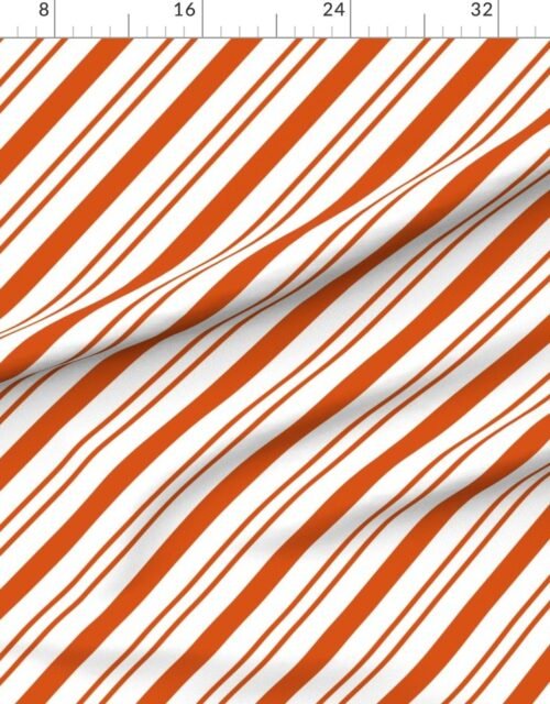 Fabric in Classic Orange Diagonal Christmas Candy Stripes on White Background Fabric