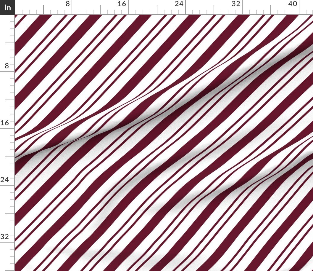 Fabric in Classic Cranberry Diagonal Christmas Candy Stripes on White Background Fabric Fabric in Classic Cranberry Diagonal Christmas Candy Stripes on White Background Fabric