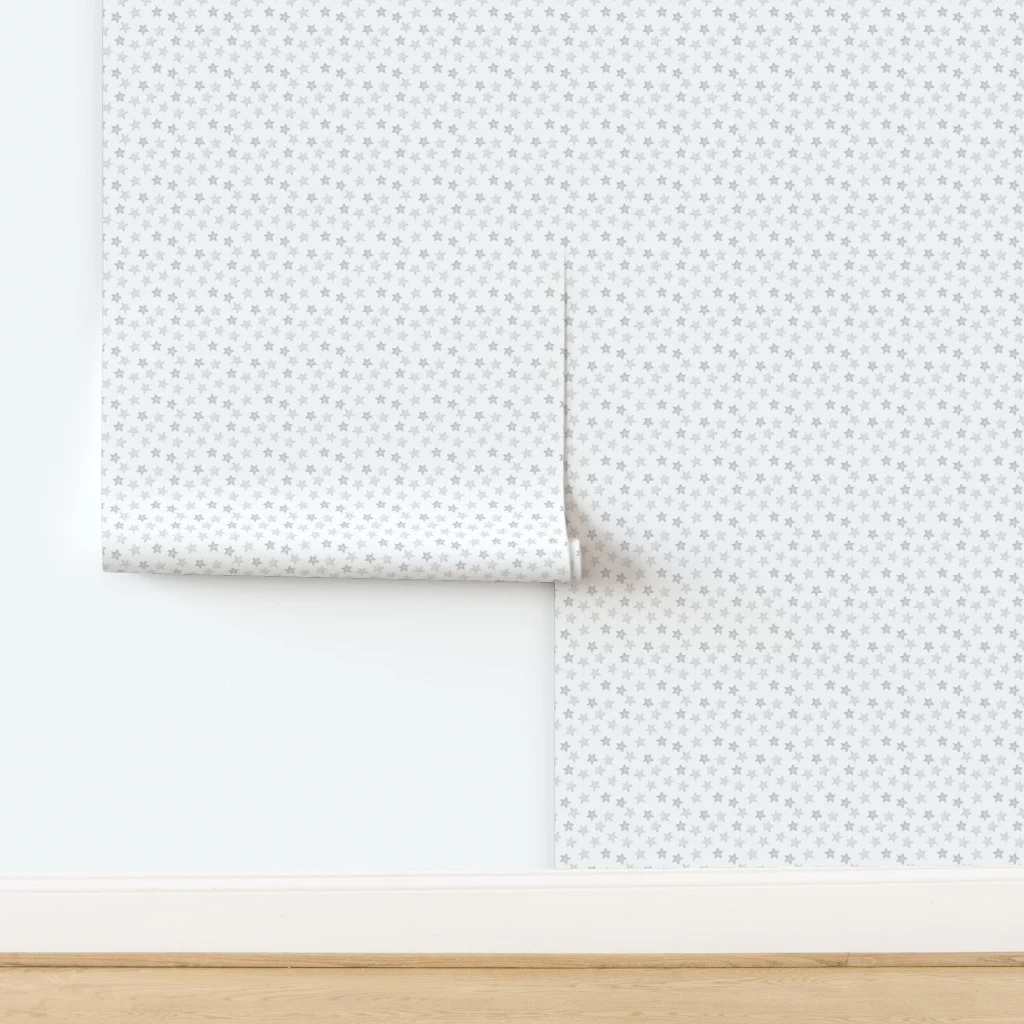 Small Faded Silver Christmas Stars on White Wallpaper design