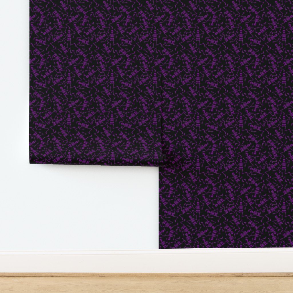 Small Purple Dancing Halloween Skeletons Scattered On Black Wallpaper design