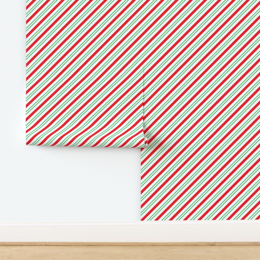 Red and Green Diagonal Christmas Candy Stripes Wallpaper design