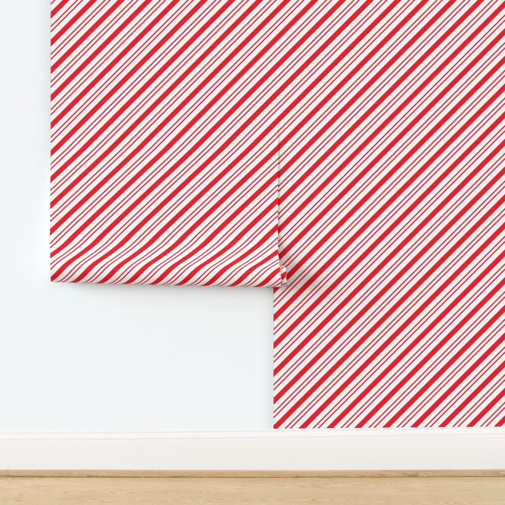 Red Diagonal Christmas Candy Stripes Wallpaper design