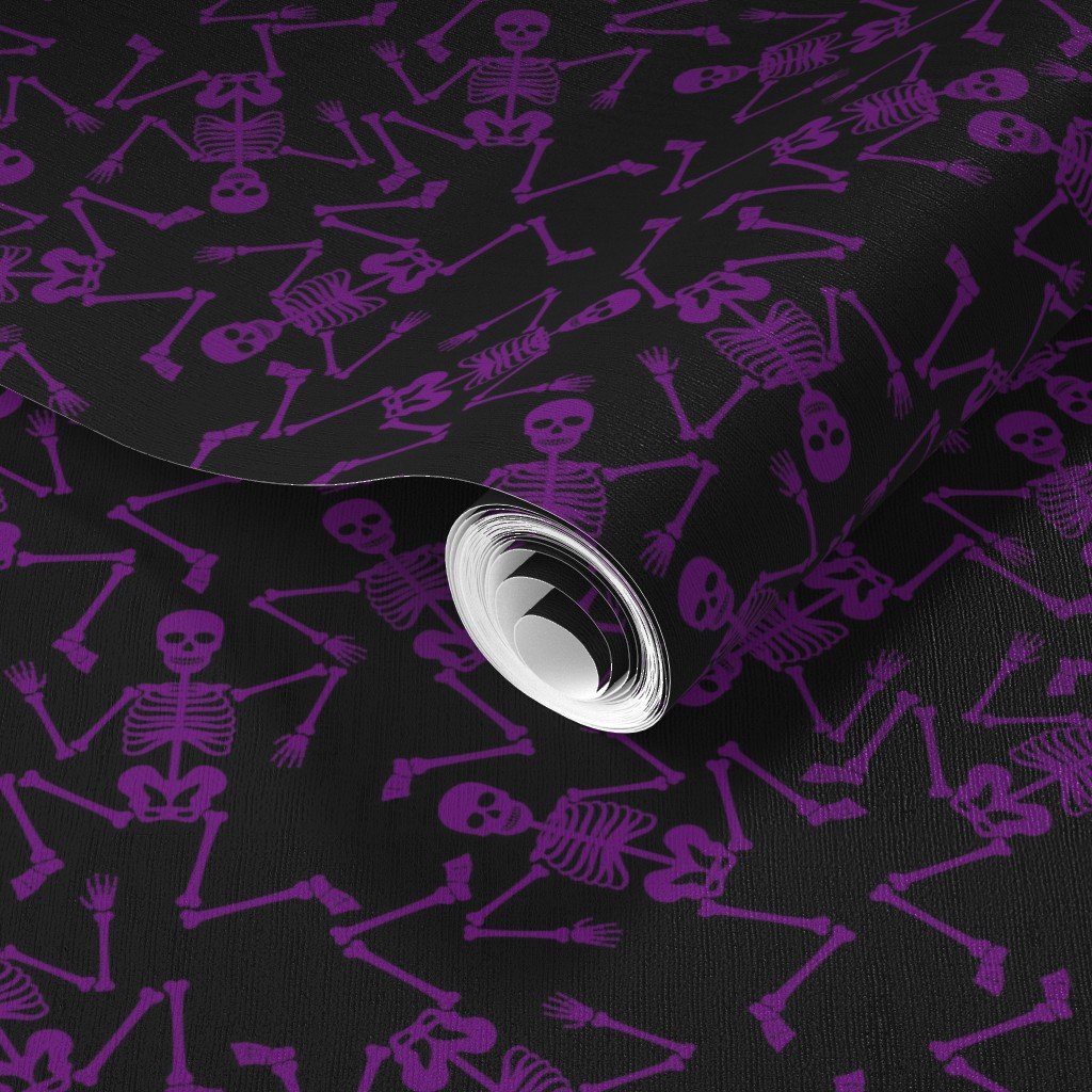 Small Purple Dancing Halloween Skeletons Scattered On Black Wallpaper scattered skeletons wallpaper