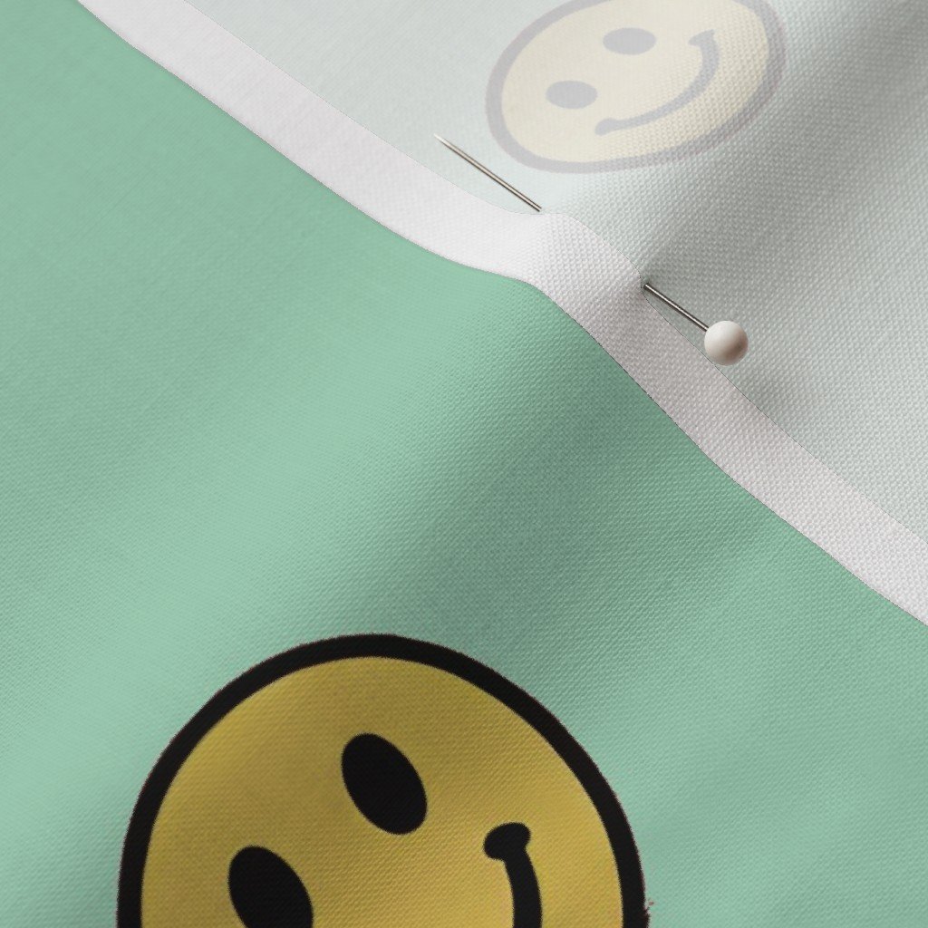 Retro Yellow Smiley Faces on Mint Green Fabric mint green fabric