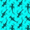 Hammerhead Sharks in Dark Silhouette Circling in Aqua Blue Water