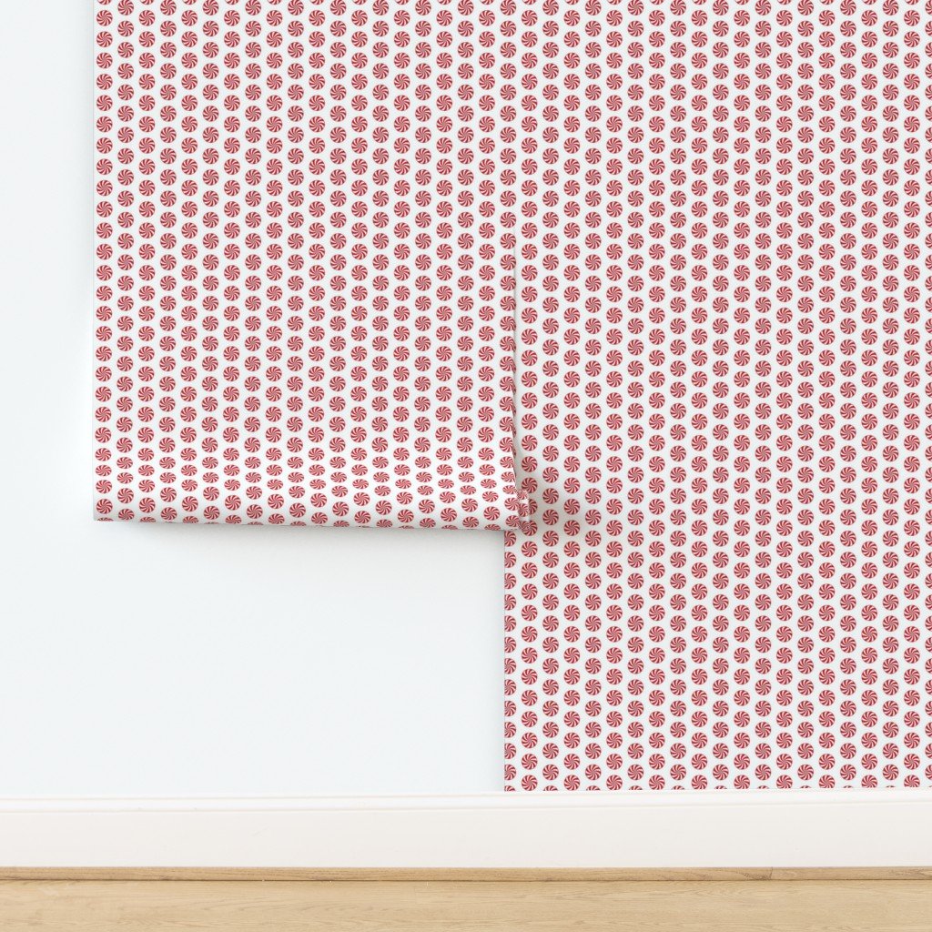 Red and White Peppermint Christmas Candy Swirls on White Wallpaper design