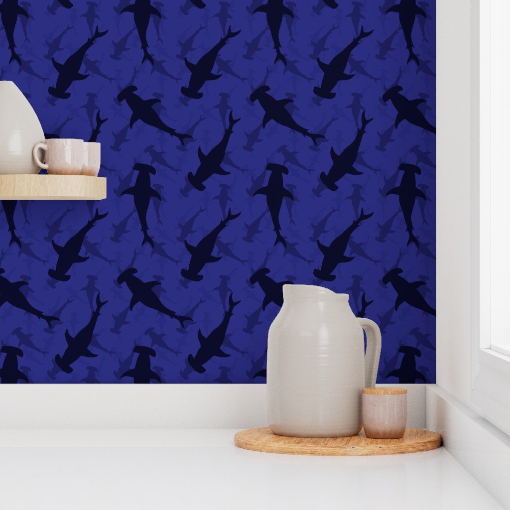 Hammerhead Sharks in Blue Silhouette Circling in Dark Blue Water Wallpaper blue wallpaper