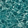 Deep Teal Ocean Water Ripple Reflections with Shimmering Coastal Waves