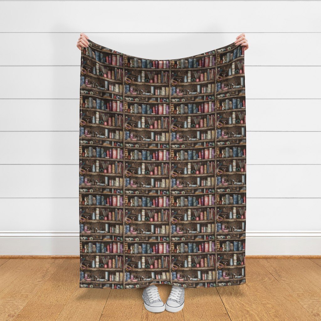 Vintage Bookcase Filled with Fabric Bobbins and Sewing Spools Fabric colorful threads fabric