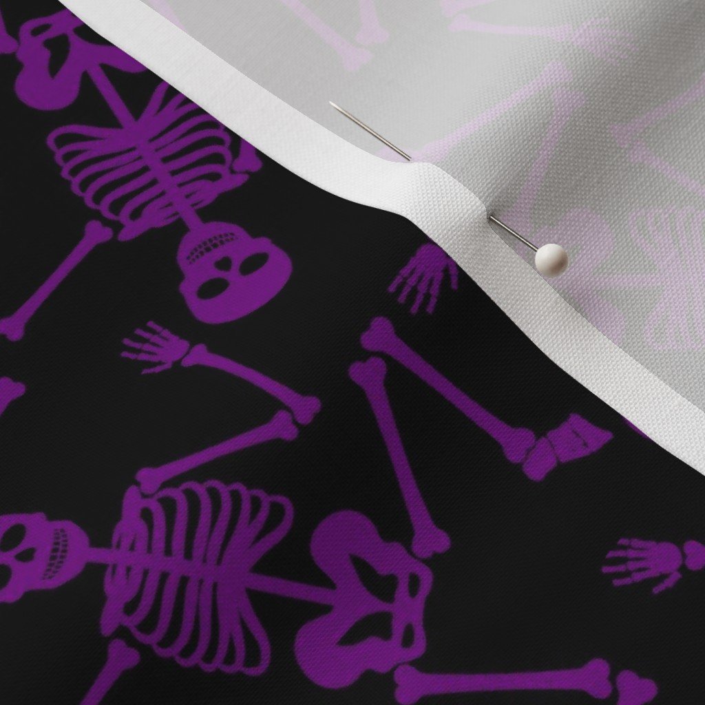 Small Purple Dancing Halloween Skeletons Scattered On Black Fabric bright purple fabric