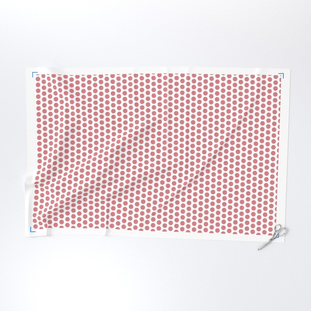 Red and White Peppermint Christmas Candy Swirls on White Fabric christmas candy fabric