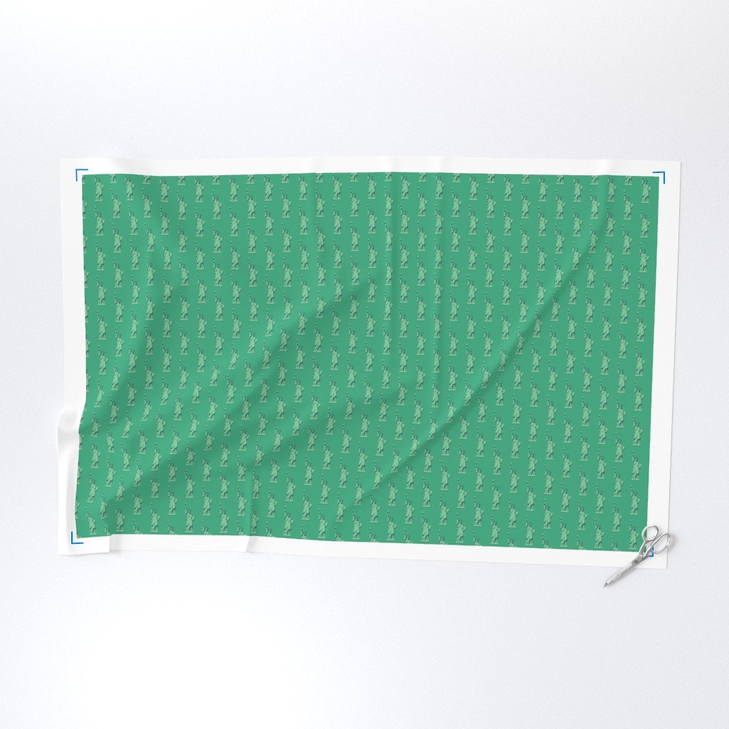 Mini Lady Liberty Statues Repeat in Beguiling Green Fabric green color fabric