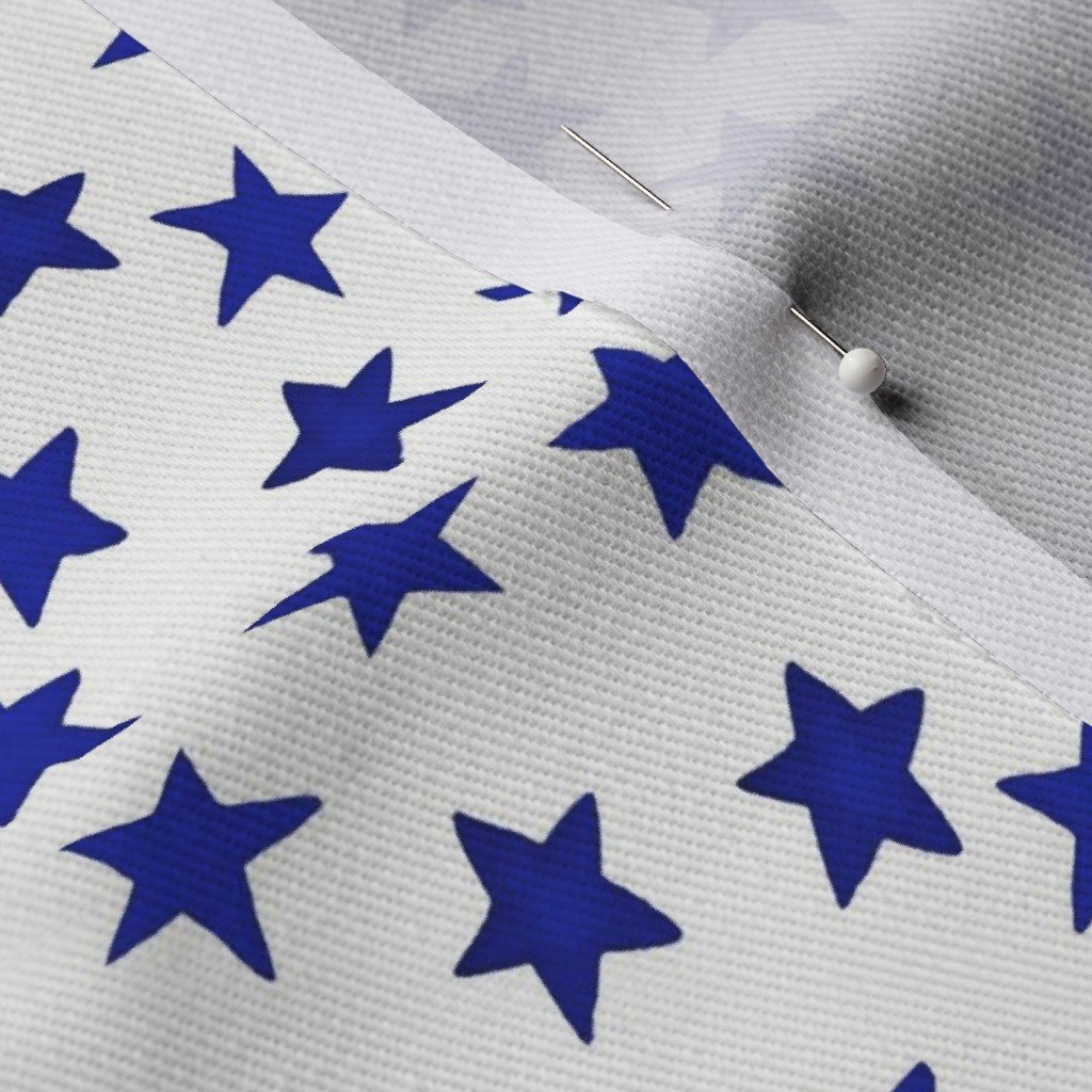 Small Faded Royal Blue Christmas Stars on White Fabric christmas pattern fabric