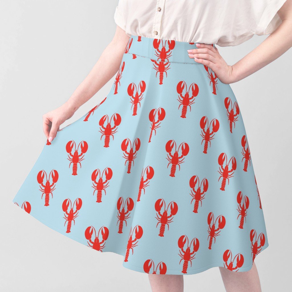 Handdrawn Motif of a Red Lobster on Pale Blue Fabric maine lobsters fabric