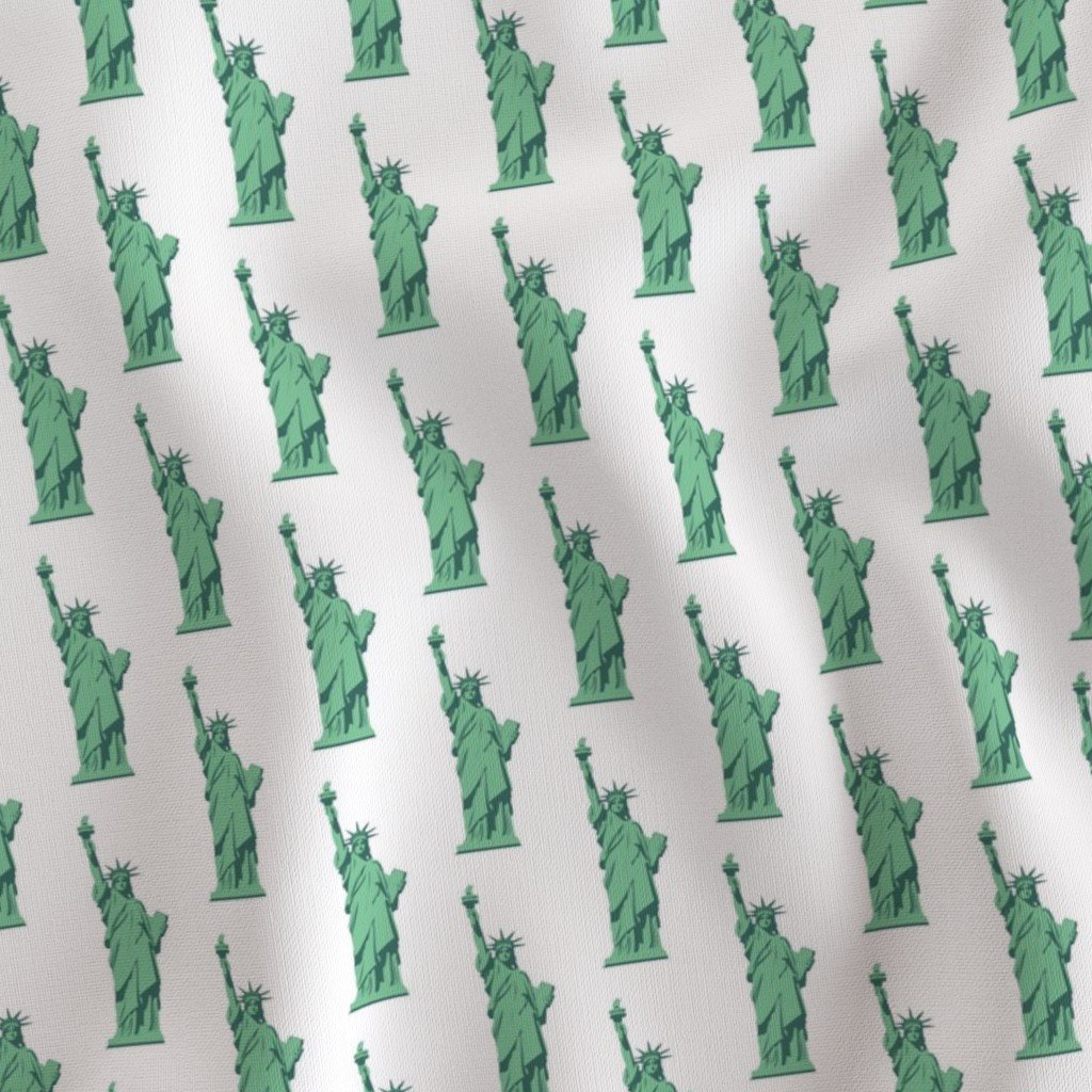 Mini Lady Liberty Statues Repeat in Beguiling Green on White Fabric green color fabric