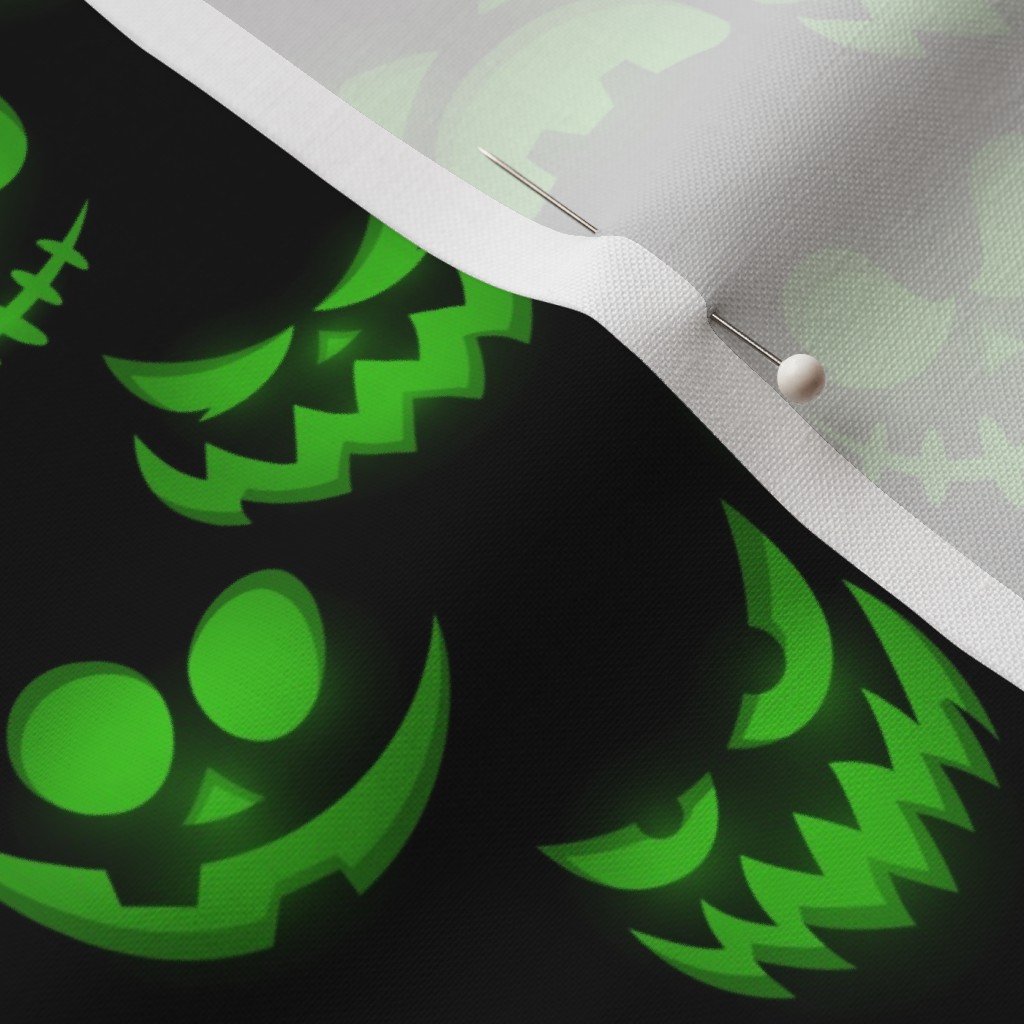 Mini Grinning Halloween Jack o Lantern Faces in Neon Green on Black Design Collection Interior Collection luminous faces fabric
