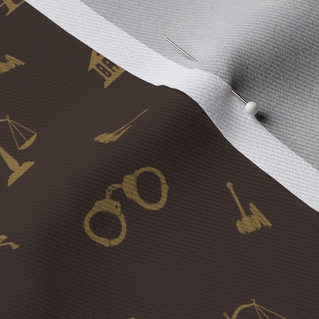 Louis Lawyer Symbols and Motifs in Tan on Brown Fabric brown fabric