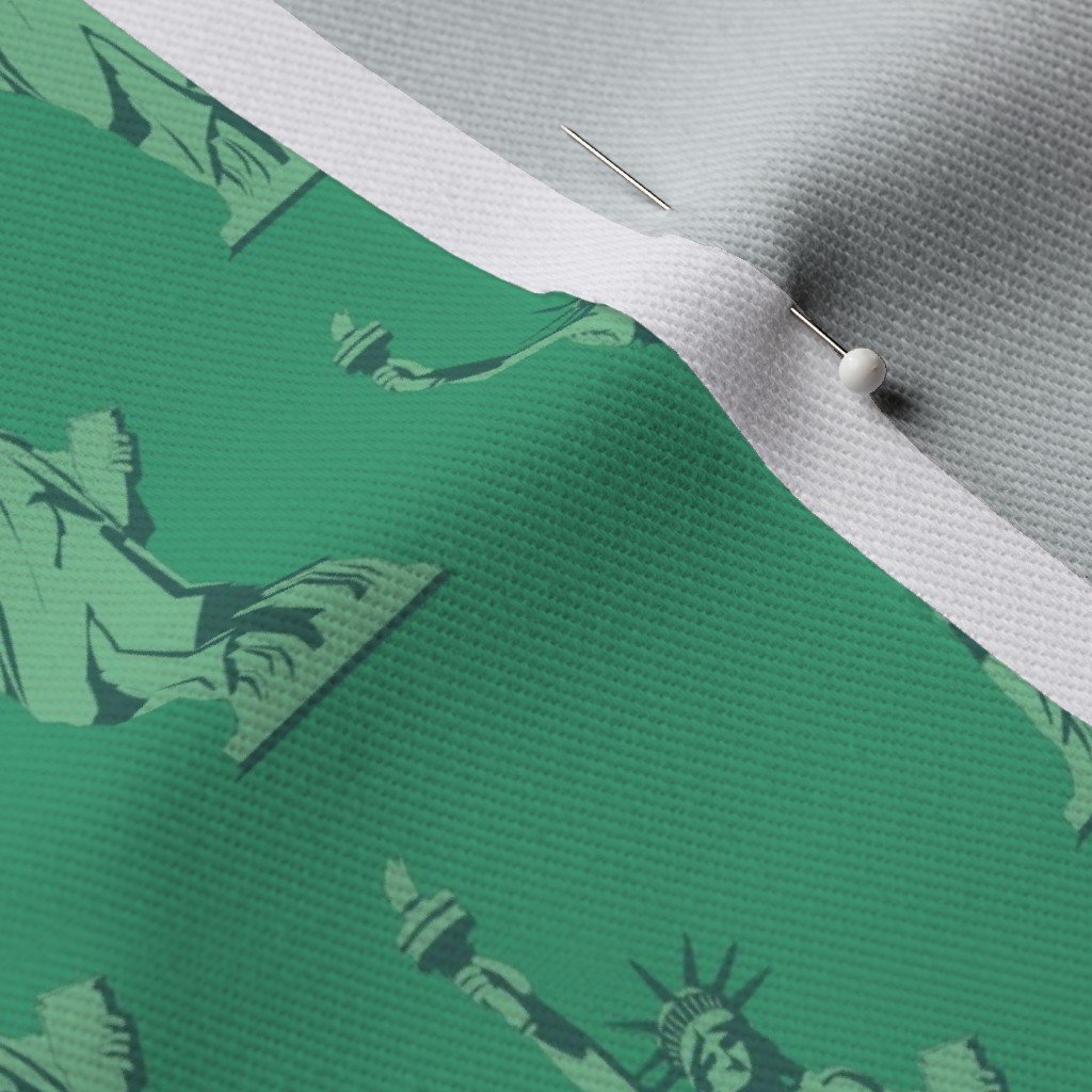 Mini Lady Liberty Statues Repeat in Beguiling Green Fabric lady liberty fabric