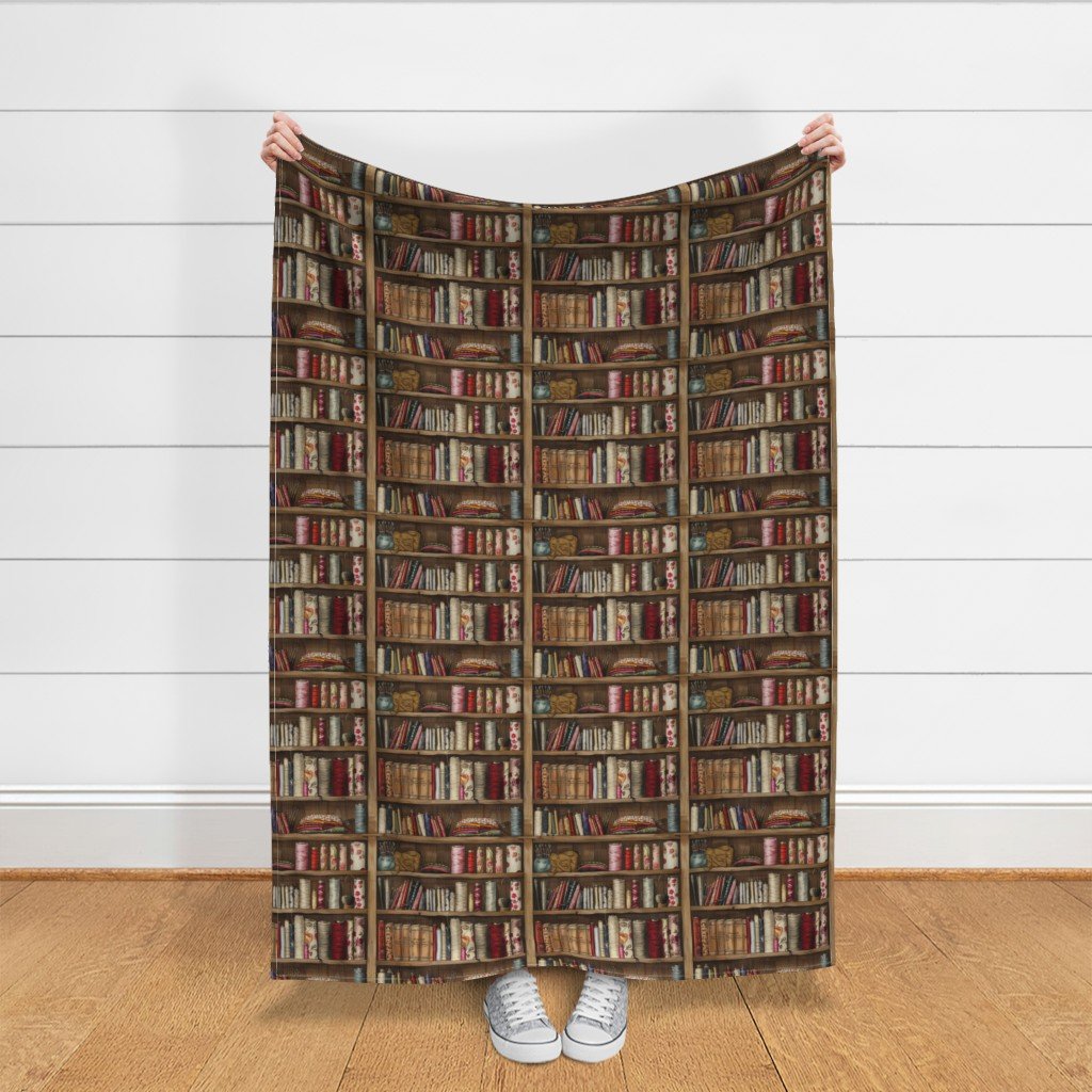 Vintage Bookcase with Fabric Bobbins Spools and Yarn Fabric warm tones fabric