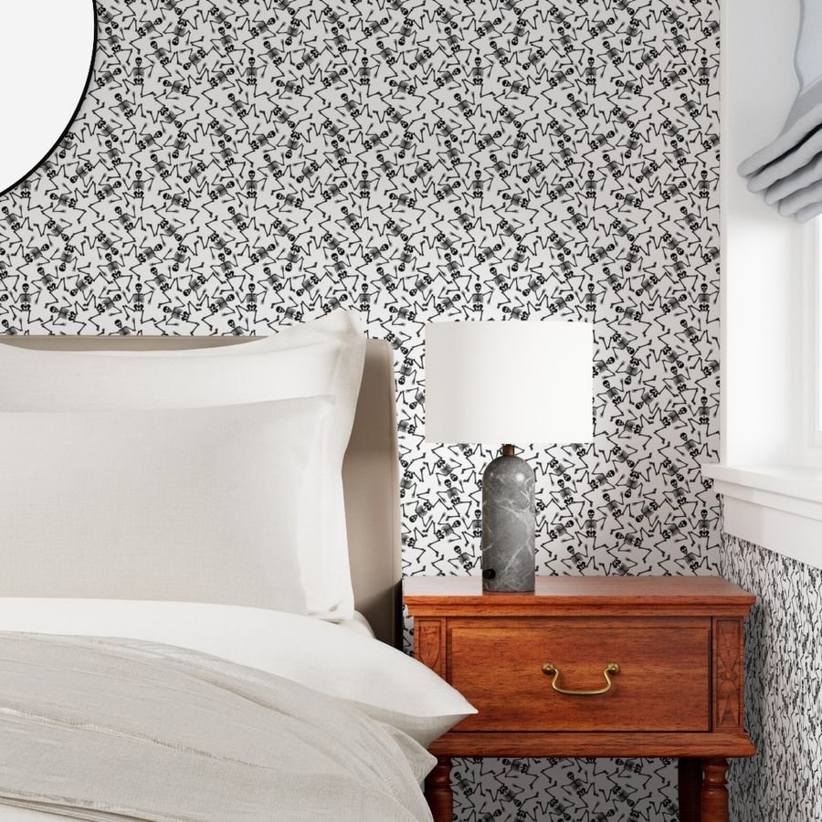 Small Black Dancing Halloween Skeletons Scattered On White Wallpaper black and white wallpaper