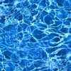 Blue Pool Water Ripple Reflections with Shimmering Summer Waves
