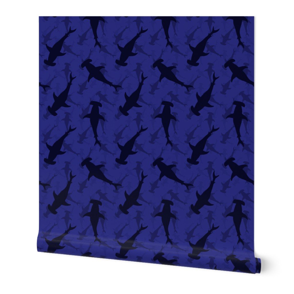 Hammerhead Sharks in Blue Silhouette Circling in Dark Blue Water Wallpaper blue wallpaper