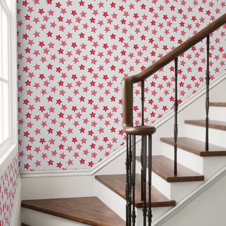 Large Faded Red Christmas Stars on White Wallpaper faded red wallpaper