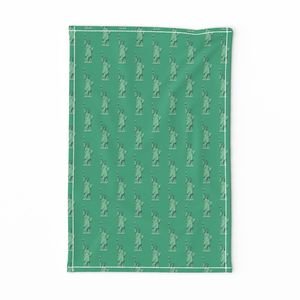 Mini Lady Liberty Statues Repeat in Beguiling Green Decor Collection Home Styling Collection green copper tea towel design