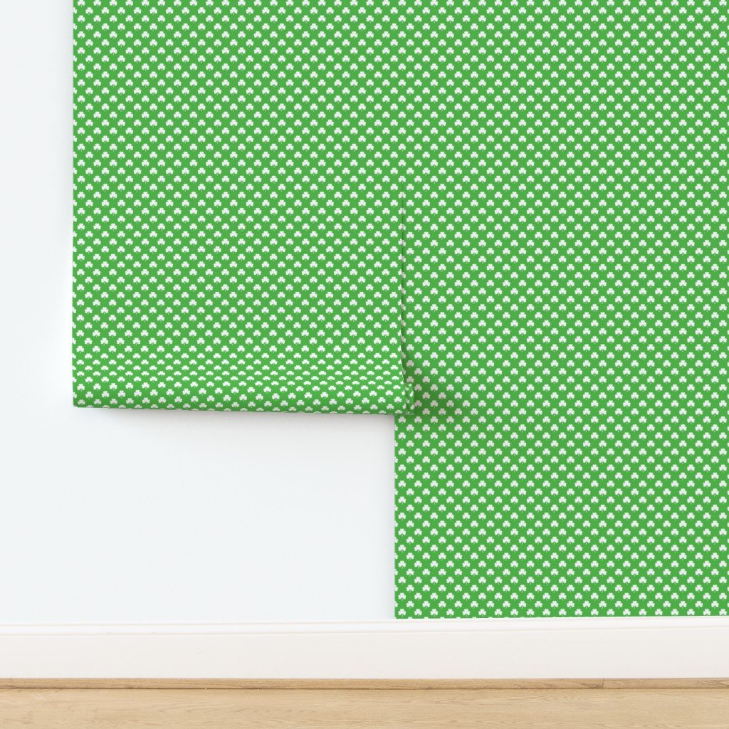 White Heart-Shaped Clover on Green St. Patricks Day Wallpaper design