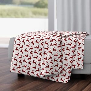 Large Dark Christmas Candy Apple Red Leaping Reindeer on White Interior Collection Decor Collection red reindeer throw blanket design